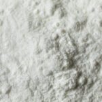 Sodium Cocoyl Isethionate (SCI): Properties, Benefits, and Formulation Uses Close up image of sodium cocoyl isethionate powder