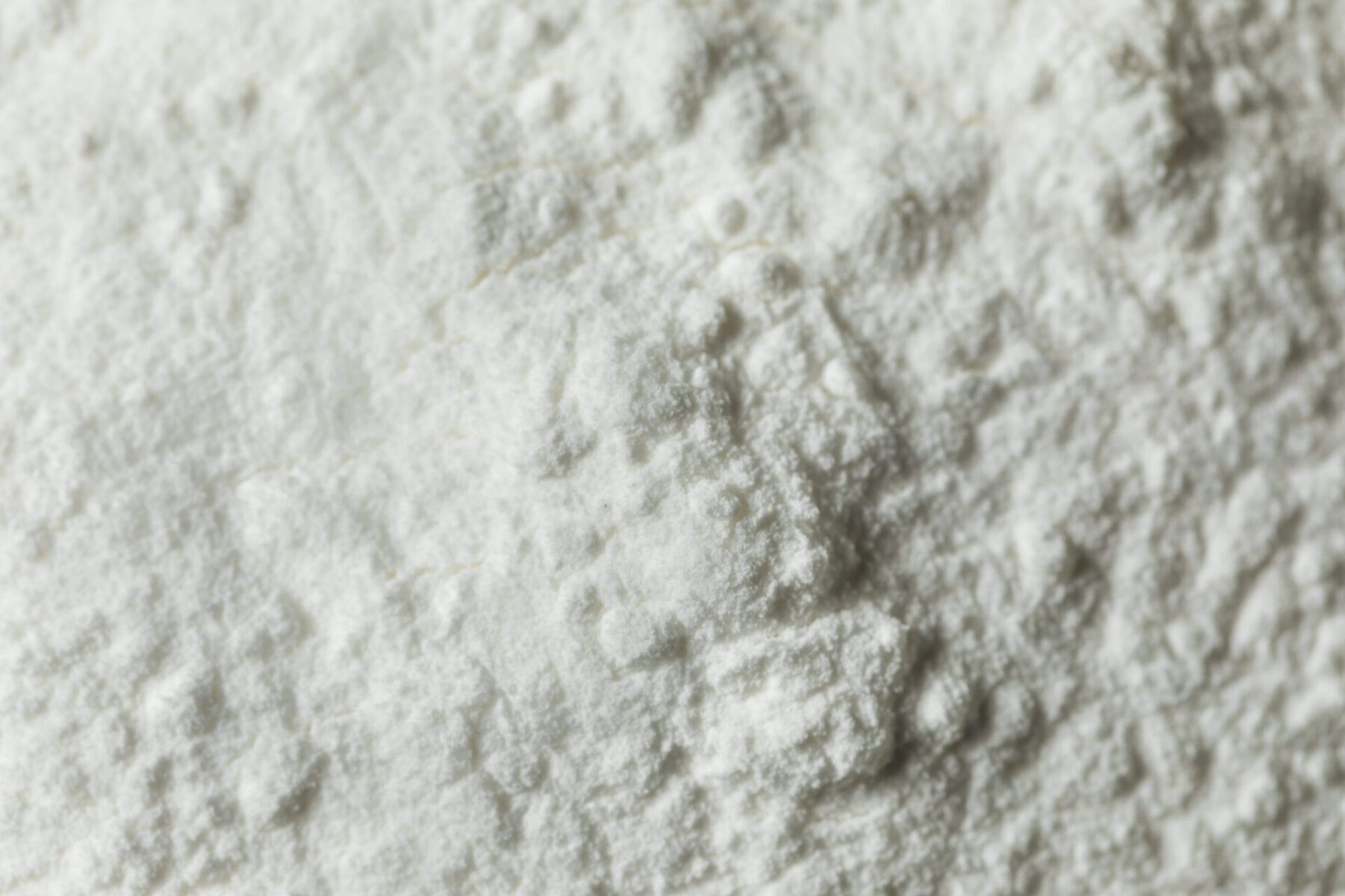 Close up image of sodium cocoyl isethionate powder